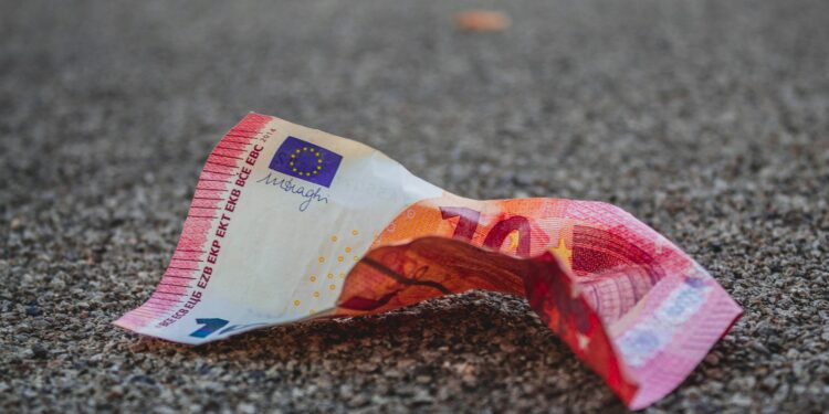 10 banknote on gray surface